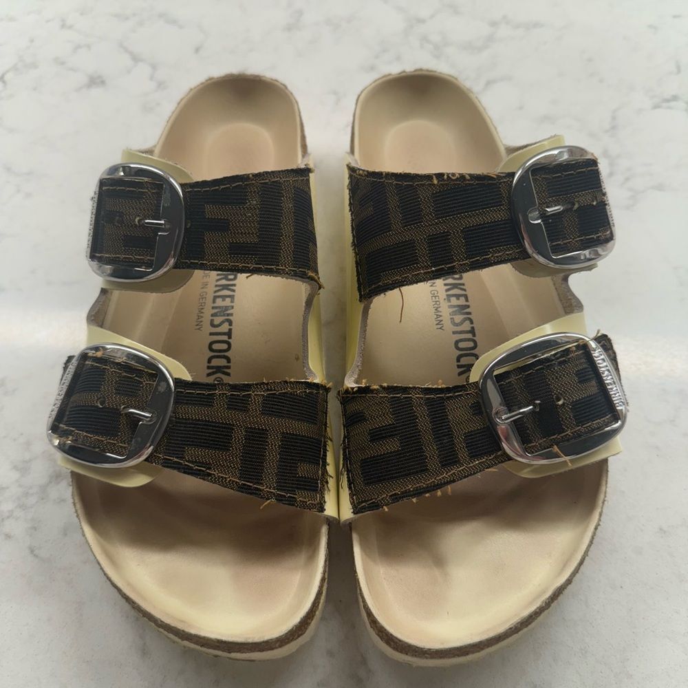 Birkenstock Two-Strap Sandals in Black and Brown with Silver Buckles